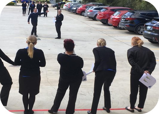 Delivering DISC Work Party team in a car park